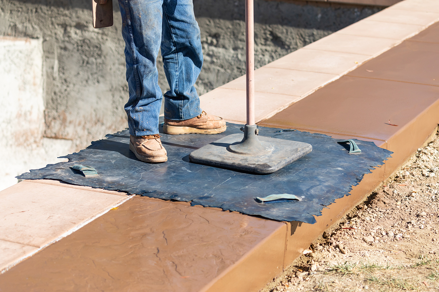 worker standing in the mat